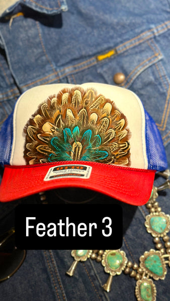 RED WHITE AND BLUE FEATHER TRUCKER HAT