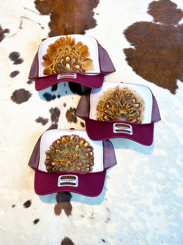 BURGUNDY AND WHITE FEATHER TRUCKER HAT